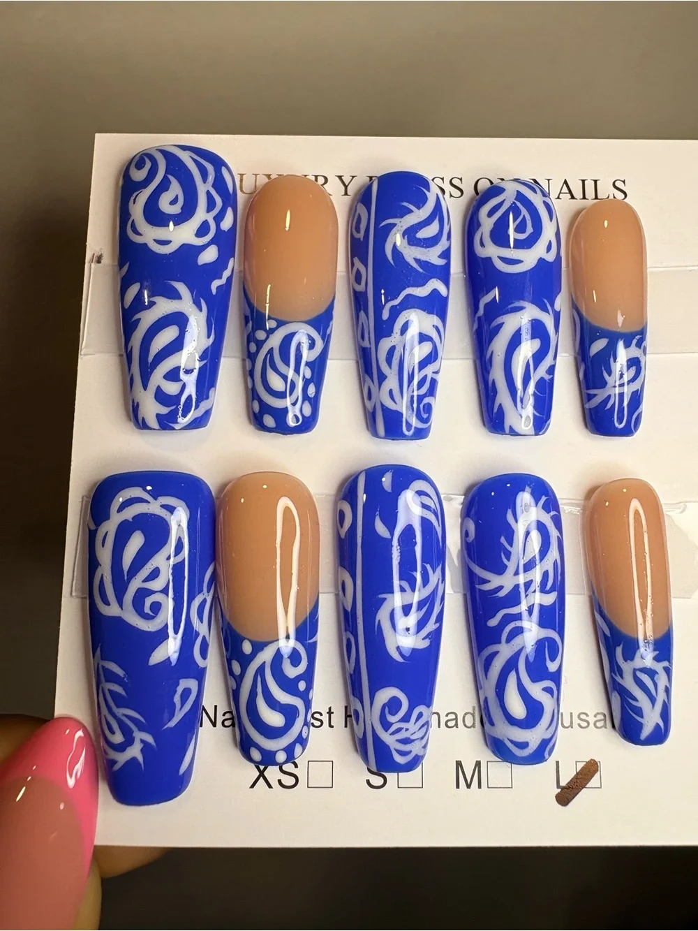 Bold Blue Swirl Press-On Nails with Nude Accents